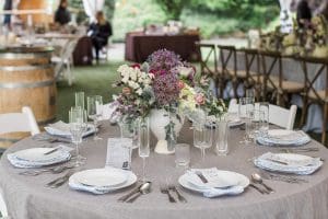 round tablescape on lavender linen