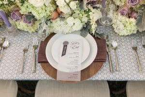 wood charger white plate table setting
